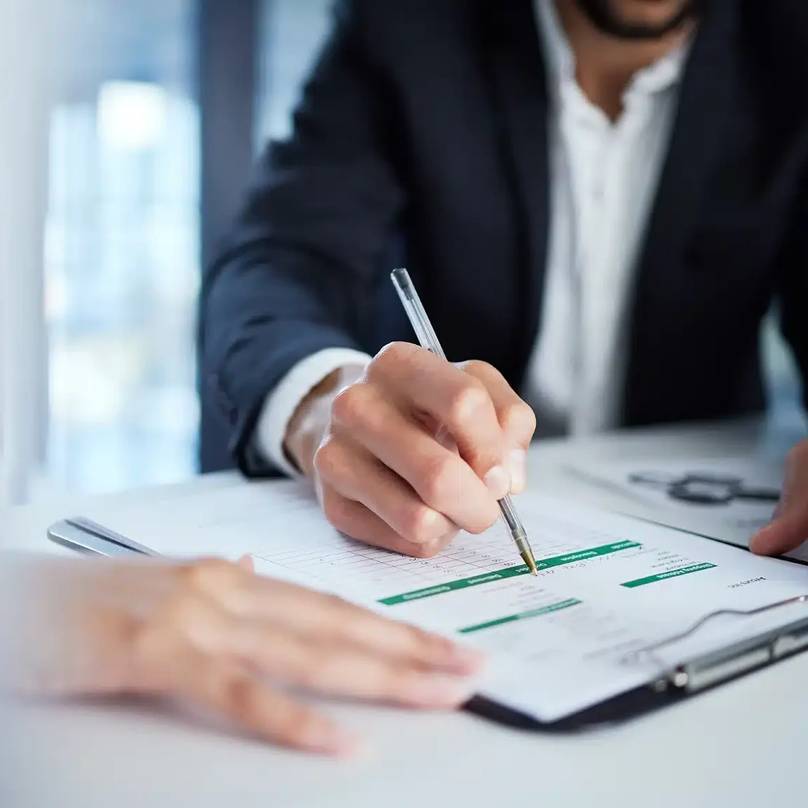 A legal representative showing a client medical documentation