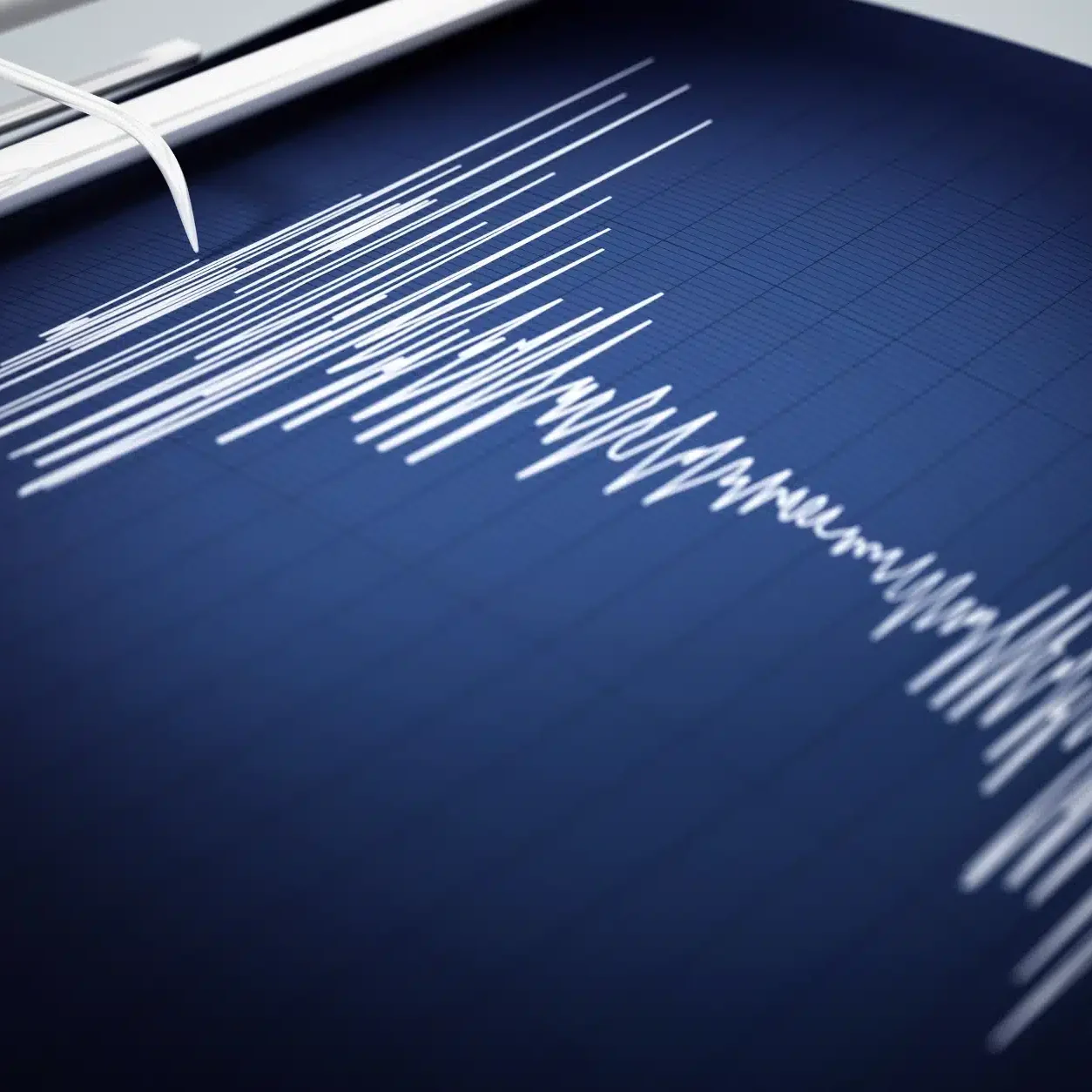 A blue seismograph recording seismic waves.
